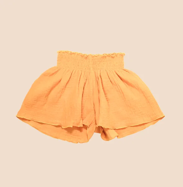 REM Gold Muslin Smocked Waist Flowy Shorts